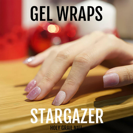 Stargazer pink ombre gel nail wraps on hand showing shimmer gradient finish