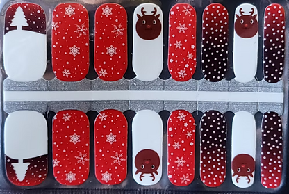 Red and white Christmas nail wraps with reindeer, snowflakes, polka dots and tree motifs
