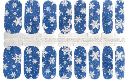 Blue glitter nail wraps with white snowflake pattern