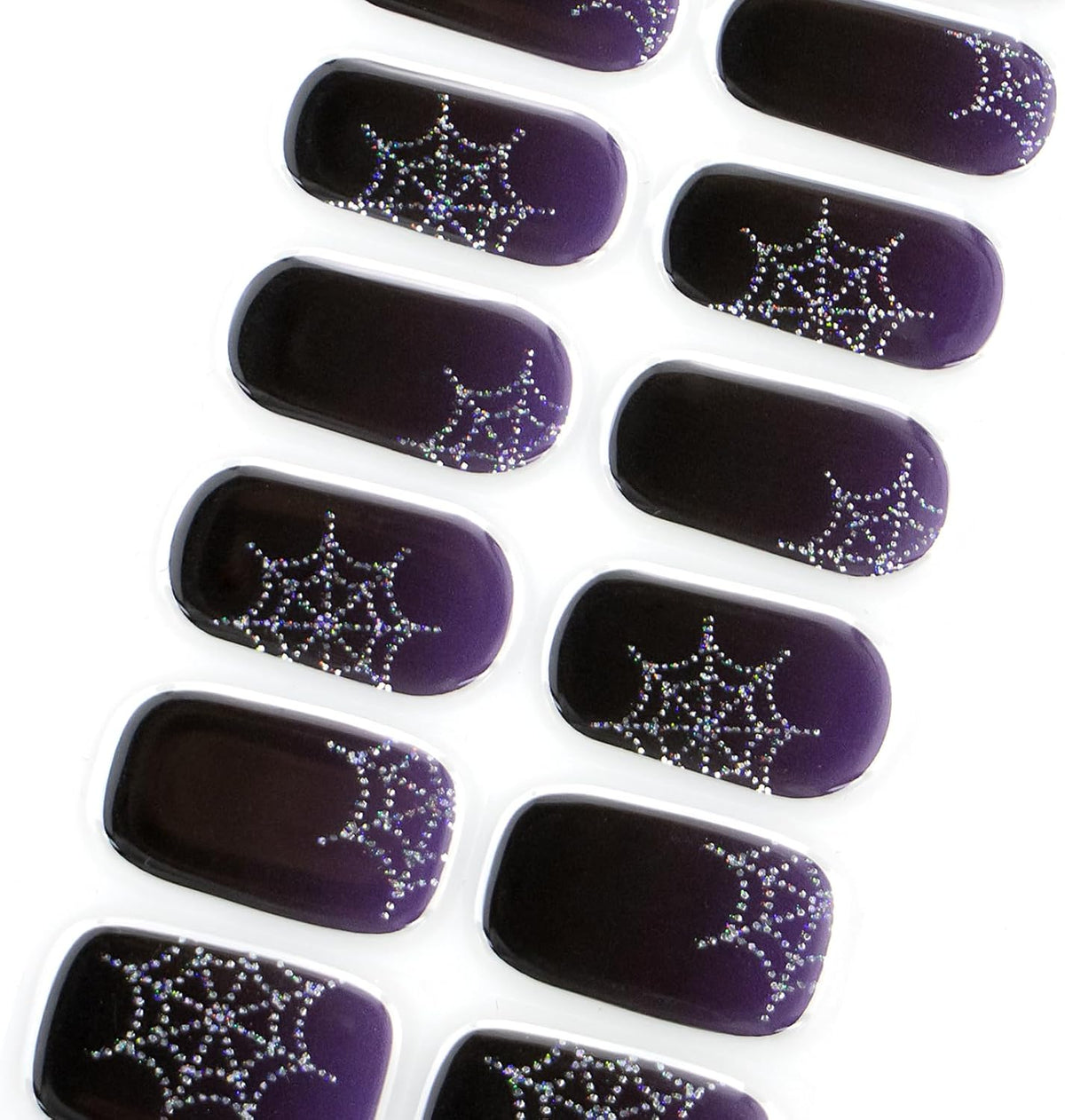 Deep purple glossy semi-cured gel nail wraps with glittery silver spiderweb corner accents.
