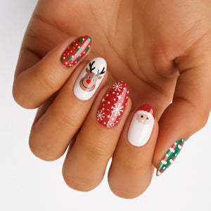 Holy Classics nail wraps with Christmas tree, reindeer, Santa and snowflake designs