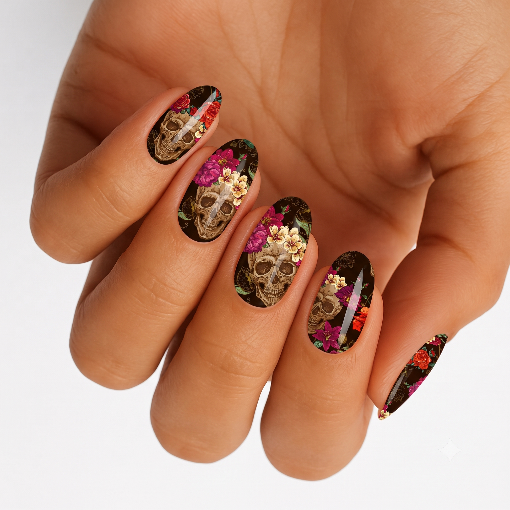 Black semi-cured gel nail wraps with floral sugar skull design and gold accents.