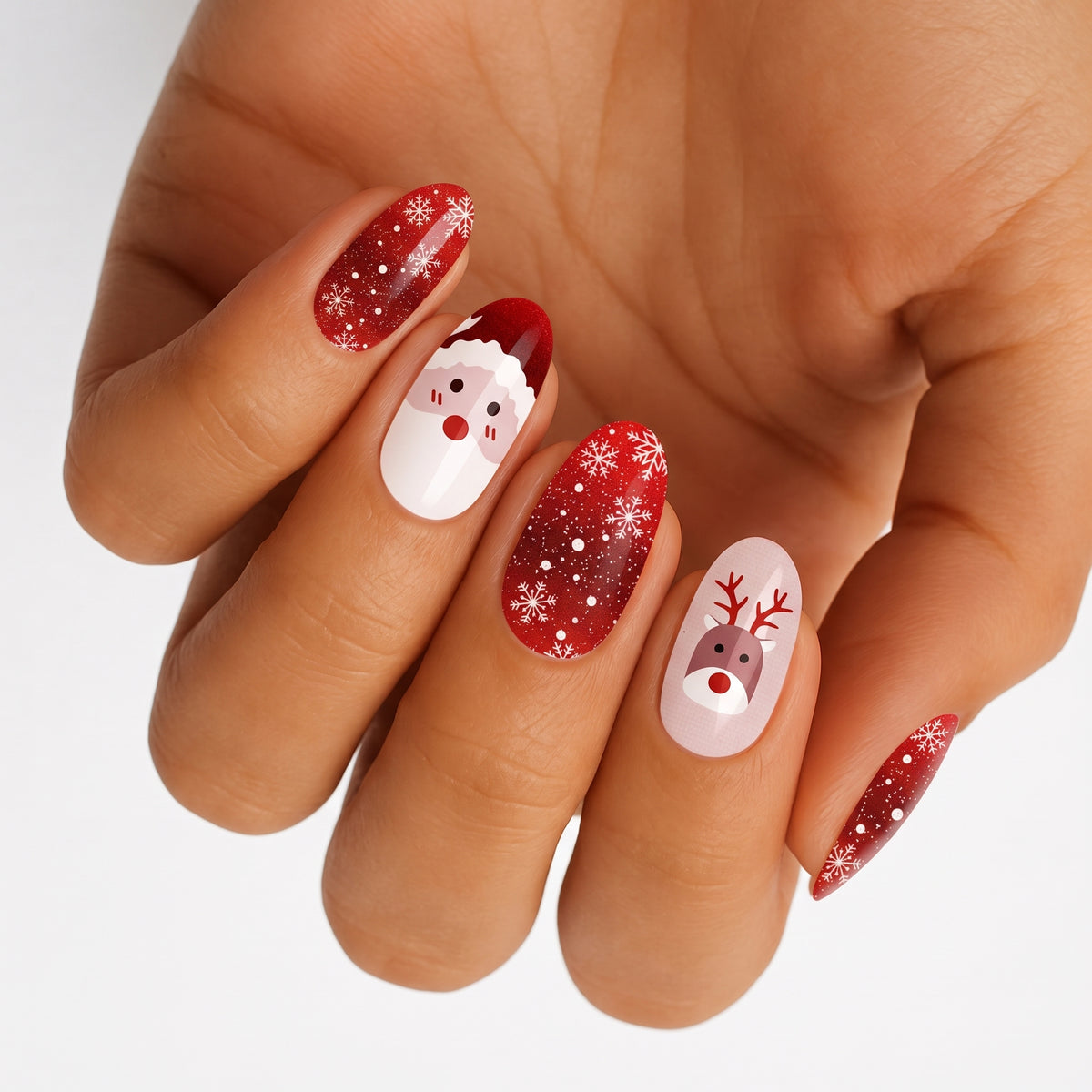 Red glitter nail wraps with snowflakes, Santa face and reindeer design