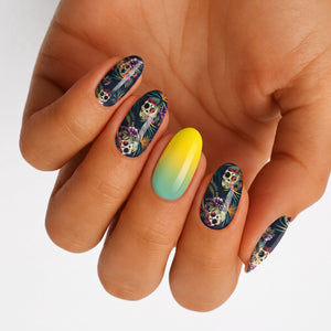 Navy nail wraps with tropical sugar skull floral print, yellow-to-teal ombre accent nail