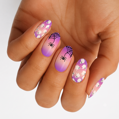 Purple-pink ombré nail wraps with Halloween ghosts, spiders, and web design