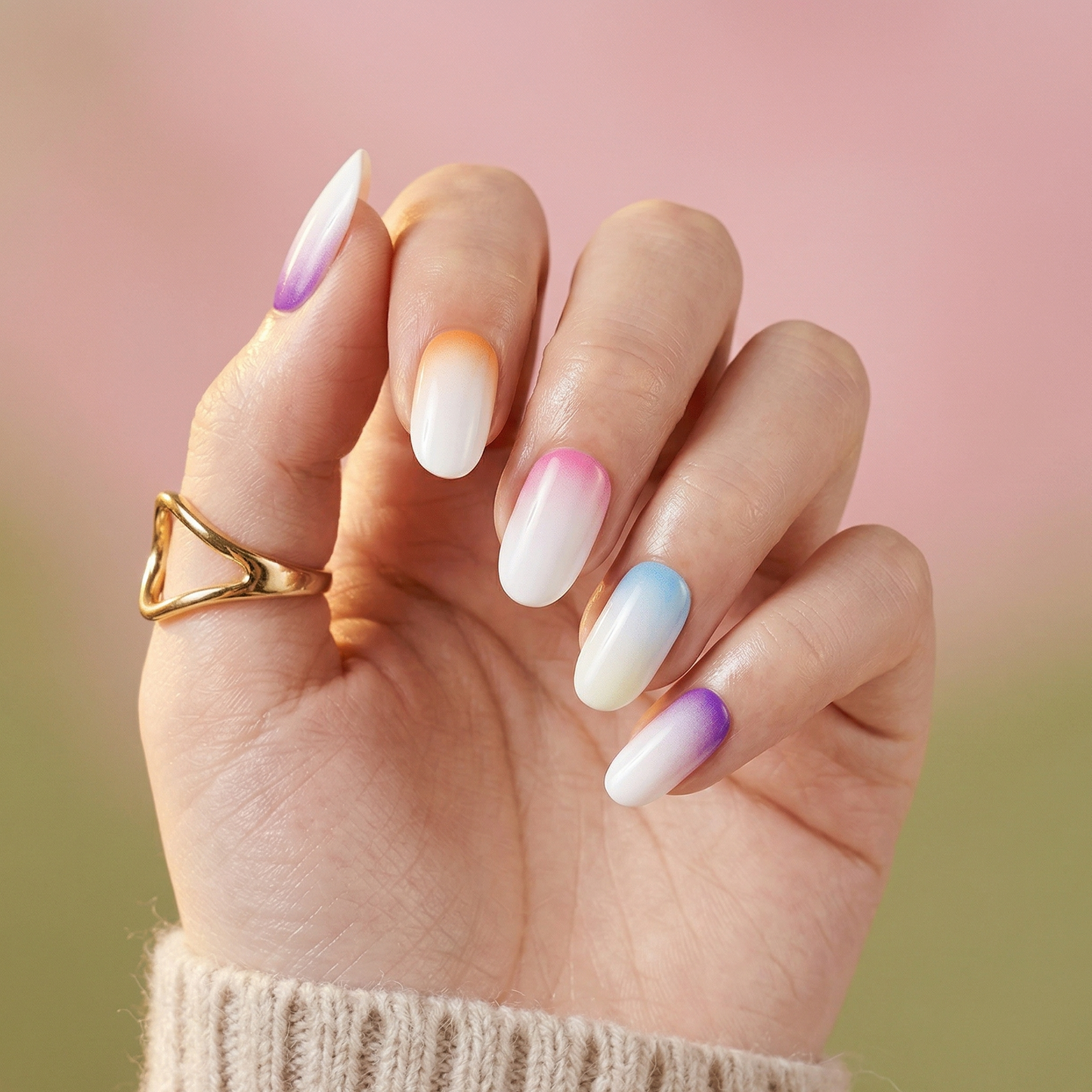Colourful ombre nail wraps in rainbow gradient on oval nails with white tips