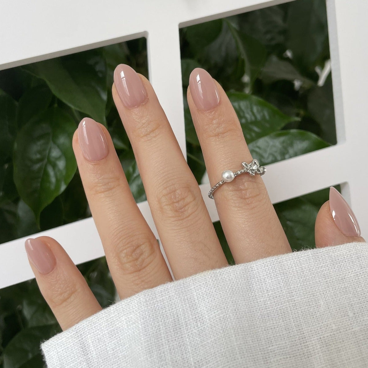 Glossy mauve-pink semi-cured gel nail wraps in a solid, glossy finish, almond shape