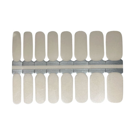 Semi-cured gel nail wraps in solid cream-beige with a subtle shimmer finish