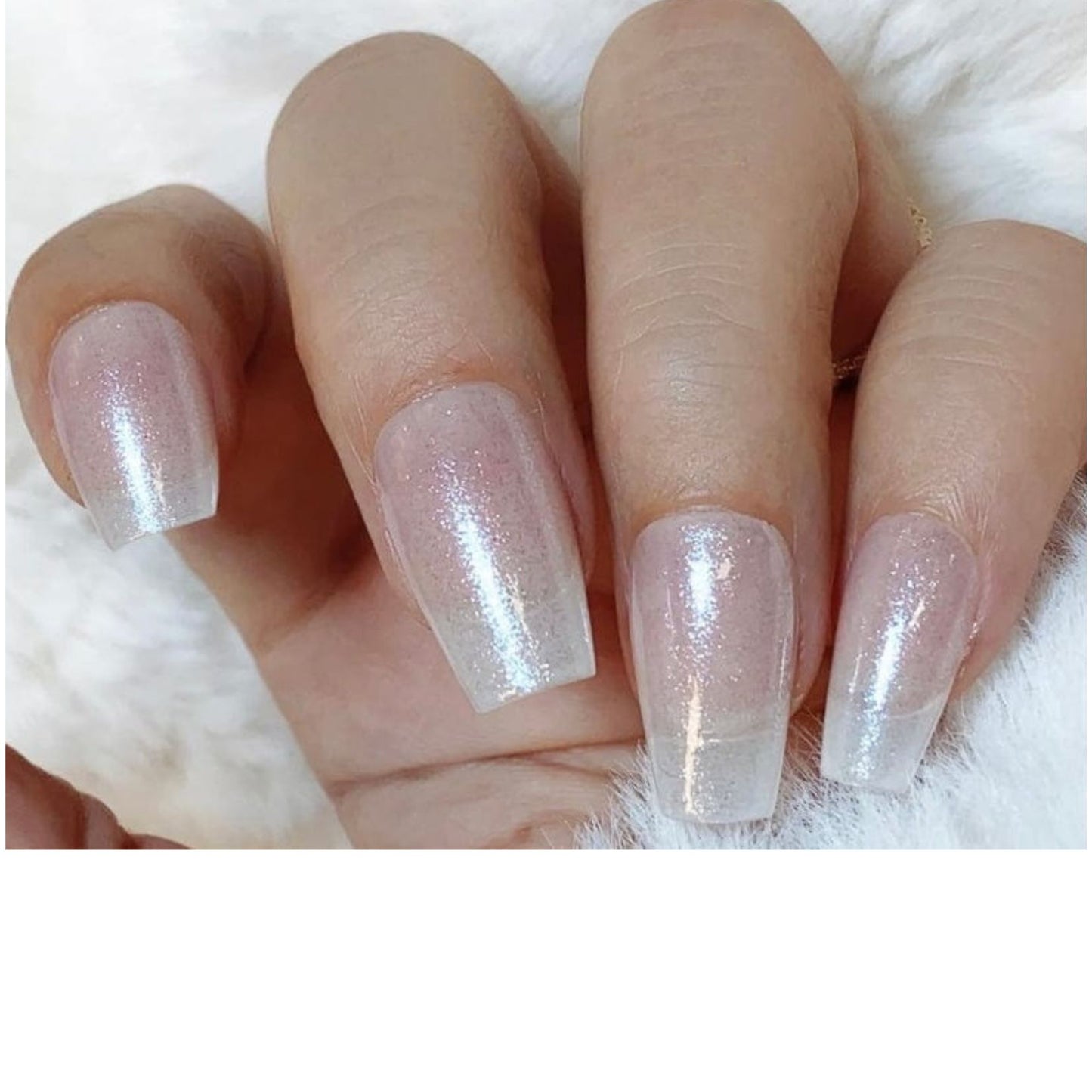 Sheer pink semi-cured gel nail wraps with pearlescent shimmer on coffin-shaped nails.