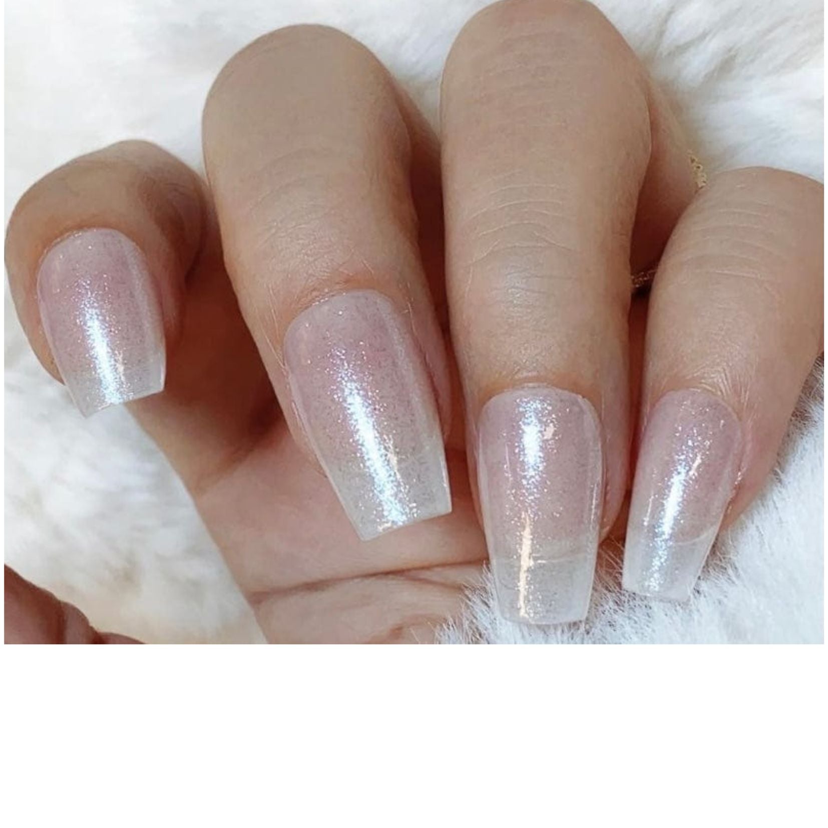 Sheer pink semi-cured gel nail wraps with pearlescent shimmer on coffin-shaped nails.