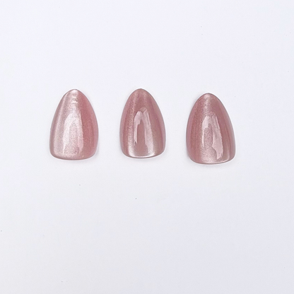 Metallic rose pink press-on nails, short round almond shape, shimmering chrome finish