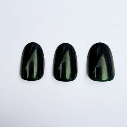 Dark forest green glossy press-on nails, solid color, round-square shape