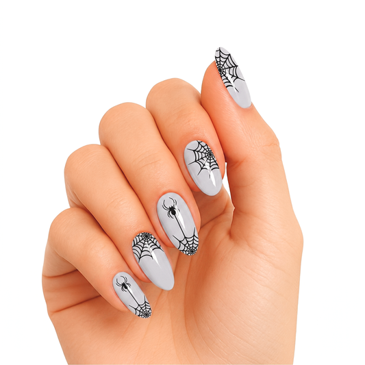 White glossy press-on nails with black spiderweb and spider Halloween design, almond shape