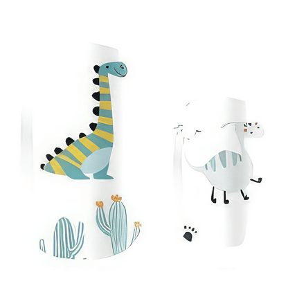 Cute dinosaur kids nail wraps with colourful cartoon dinos and cacti on white background