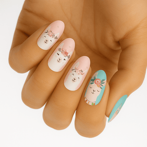 Hand wearing pastel llama nail wraps in pink and turquoise colours