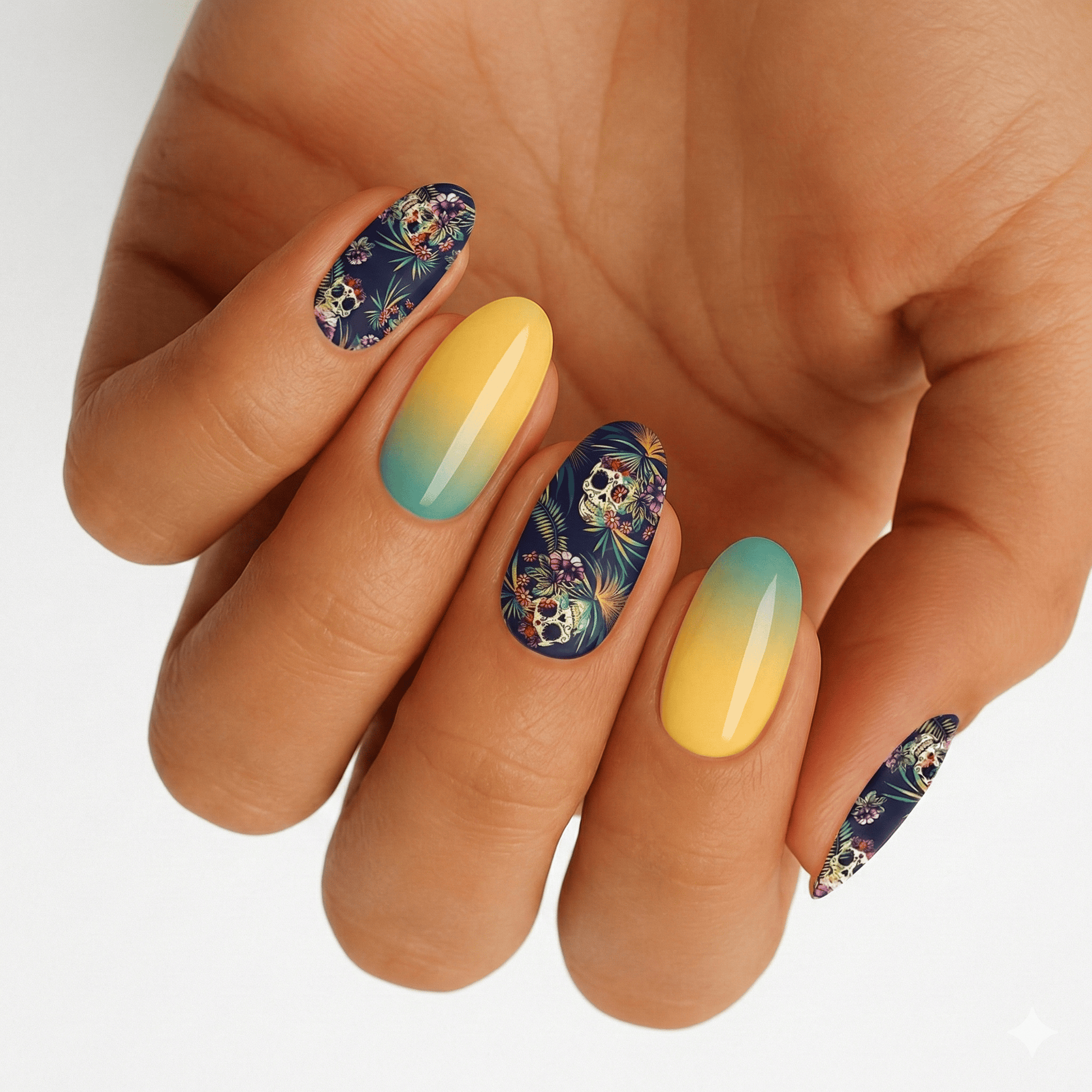 Gothic skull and floral non-UV nail wraps with yellow-green gradient nails on hand
