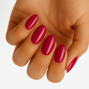 Glossy burgundy red nail wraps on hand showing bougainvillea solid colour manicure