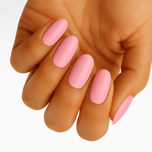 Pink matte nail wraps on hand showing bubblegum pastel manicure finish