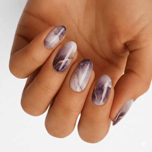 Purple marble effect gel nail wraps on hand showing glossy gradient manicure design