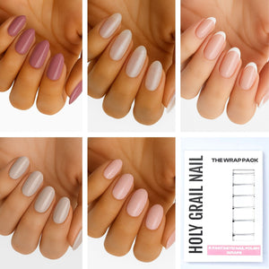 Light nude nail wraps on hands showing five natural pink and beige glossy shades