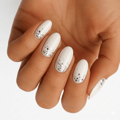 White nail wraps with silver glitter gradient on hand elegant manicure design