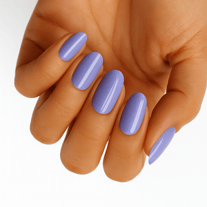 Lavender purple glossy nail wraps on hand showing elegant pastel manicure for at-home nail art
