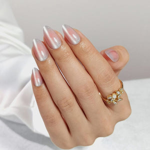 Chrome pink press-on nails in short almond shape with mirror finish on hand
