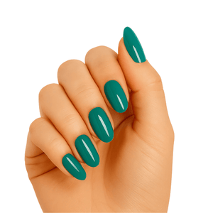 Hand wearing glossy aquamarine green gel nail wraps for at-home manicure