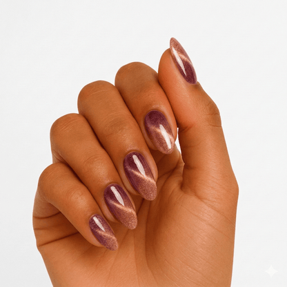 Rose gold shimmer gel nail wraps on hand showing metallic finish manicure