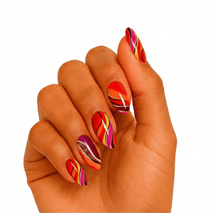 Multicoloured geometric gel nail wraps on hand featuring red orange purple striped pattern