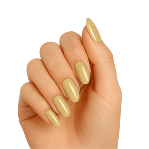 Golden metallic gel nail wraps on hand showing glossy chrome finish