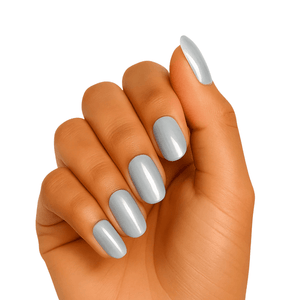Hand wearing grey pearl gel nail wraps with lustrous metallic shimmer finish